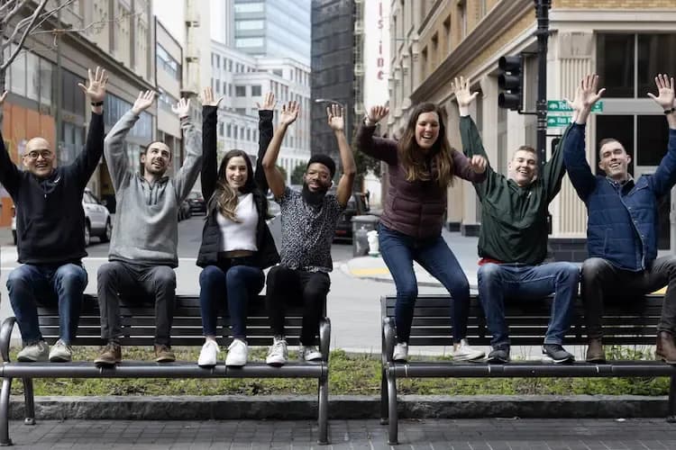 Teleport employees at Teleport's Kubecon booth
